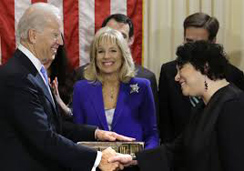 Biden holding Bible